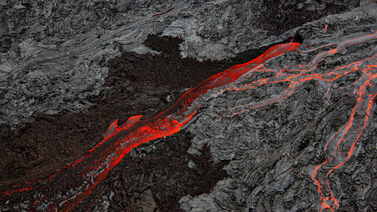 Large Igneous Provinces May Have Leaked Cryptic Carbon